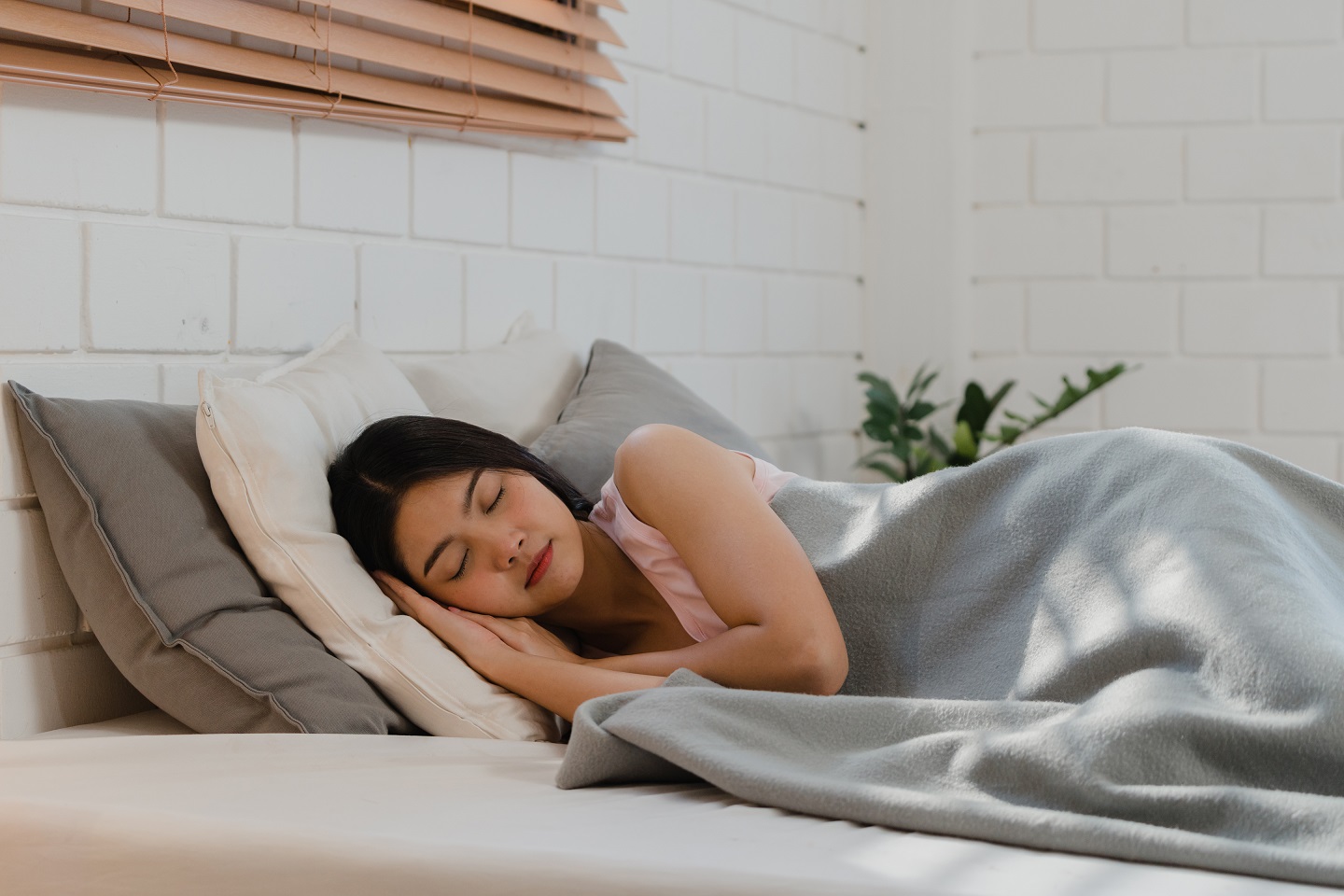 Asian Japanese woman sleep at home. Young Asian girl feeling hap